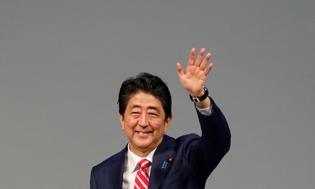 Japanese Prime Minister Shinzo Abe waves towards the delegates during the India-Japan Annual Summit, in Gandhinagar, India, September 14, 2017. REUTERS/Amit Dave