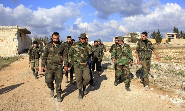 Forces loyal to Syria's President Bashar al-Assad - REUTERS