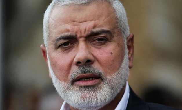 Said Khatib, AFP | Hamas Chief Ismail Haniyeh speaks to the press in the southern Gaza Strip on September 19.

