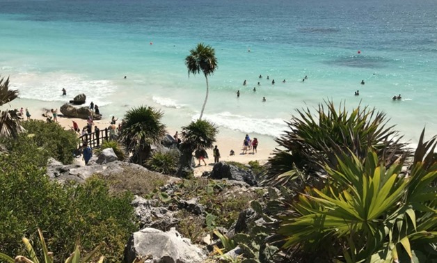 Tourists visit Tulum National Park in Mexico's Quintana Roo state, part of the so-called Riviera Maya, a stretch of pristine beaches on the country's southeastern coast -AFP