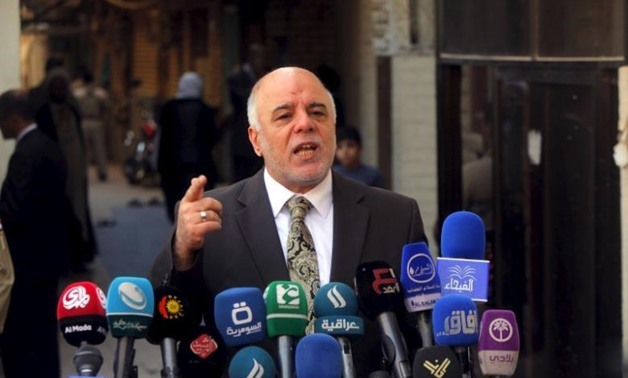 Iraqi Prime Minister Haider al-Abadi speaks at a news conference during his visit to Najaf, south of Baghdad, in this file photo taken October 20, 2014. REUTERS/Alaa Al-Marjani
