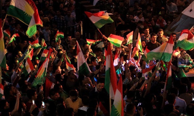Kurds celebrate to show their support for the independence referendum in Duhok - REUTERS