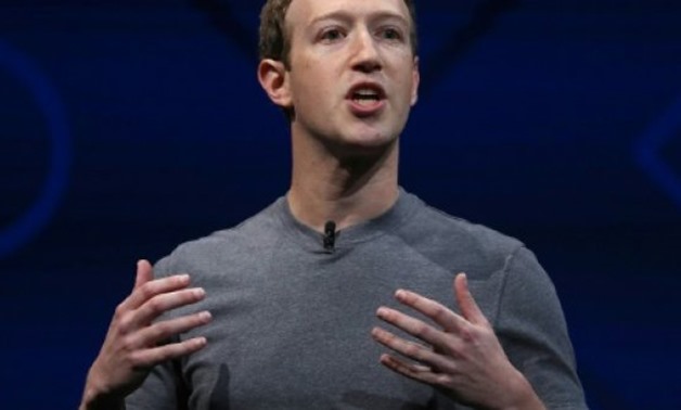 Facebook CEO Mark Zuckerberg says he regrets his work was used "to divide people rather than bring us together" - AFP