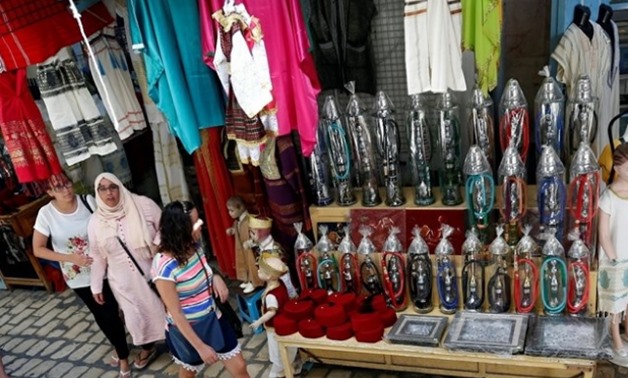 Algerian tourists are seen shopping at the old medina in Sousse, Tunisia.