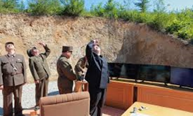 Kim Jong Un looks on during the test-launch of the intercontinental ballistic missile Hwasong-14, in this photo released July 5, 2017. KCNA/via REUTERS