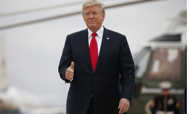 U.S. President Trump gestures before departing from Joint Base Andrews, Maryland - REUTERS