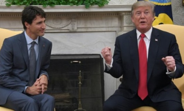  US President Donald Trump (R) and Canadian Prime Minister Justin Trudeau hold a meeting at the White House in Washington, DC - AFP
