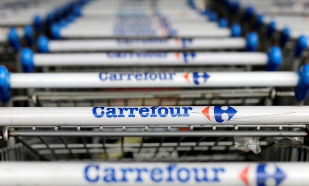 The logo of France-based food retailer Carrefour is seen on shopping trolleys in Sao Paulo, Brazil July 18, 2017. REUTERS/Paulo Whitaker/File Photo
