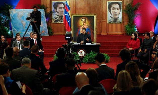 Venezuela's President Nicolas Maduro talks to the media during a news conference at Miraflores Palace in Caracas –