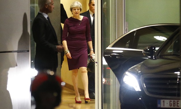 Britain’s Prime Minister Theresa May leaves the European Commission headquarters in Brussels --REUTERS
