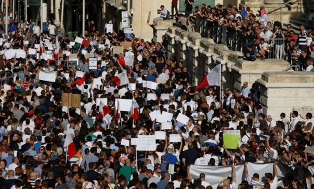 People protest against the assassination of investigative journalist Daphne Caruana Galizia last Monday, in Valletta, Malta, October 22, 2017. REUTERS/Darrin Zammit Lupi
