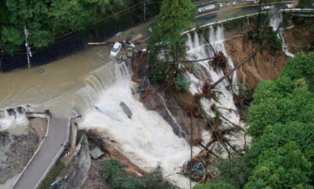 A collapsed road is seen following torrential rain caused by typhoon Lan in Kishiwada, Japan in this photo taken by Kyodo on October 23, 2017. Mandatory credit Kyodo/via REUTERS