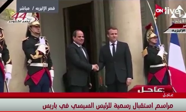 FILE PHOTO- President Abdel Fattah el-Sisi with his French counterpart Emmanuel Macron 