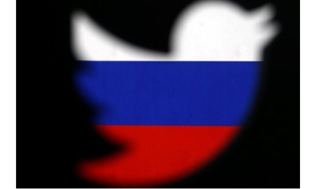 A 3D-printed Twitter logo displayed in front of Russian flag is seen in this illustration picture, October 27, 2017 -
 REUTERS/Dado Ruvic/Illustration