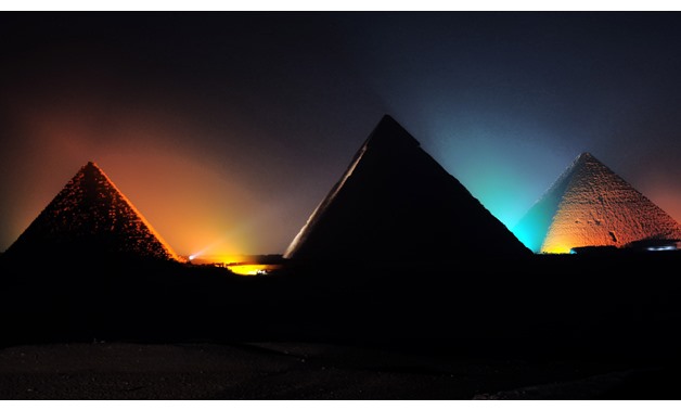 Pyramids at night in Giza, Egypt. Photo by islam102/ goodfreephotos