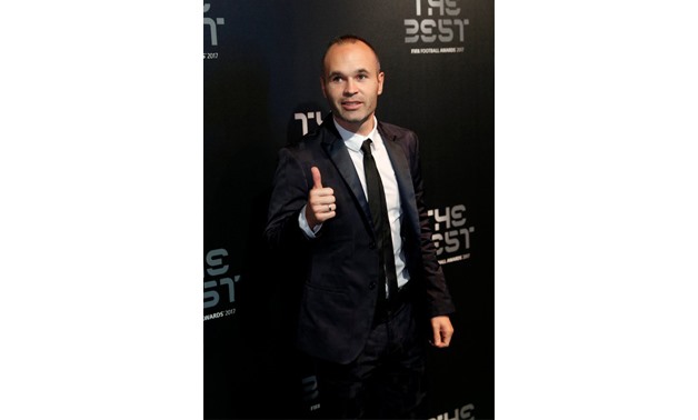 Barcelona's Andres Iniesta poses before the start of the awards Action Images via Reuters