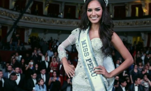 © LATINA TELEVISION/AFP / by Moises AVILA, Carlos MANDUJANO | Miss Peru 2017, Romina Lozano, was crowned after a ceremony in which contestants protested violence against women by reciting a litany of horrifying statistics illustrating the problem
