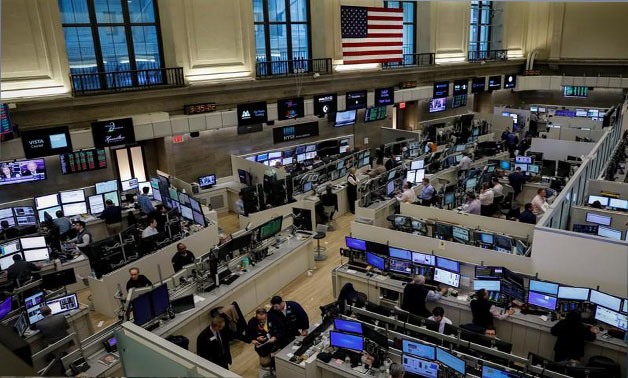 Traders work on the floor of the American Stock Exchange (AMEX) at the New York Stock Exchange (NYSE) in New York City, New York, U.S., October 27, 2017. REUTERS/Brendan McDermid