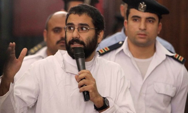 Activist Alaa Abdel Fattah speaks in front of a judge at a court during his trial in Cairo, November 11, 2014. (Source: Reuters/Al Youm 7 Newspaper)
