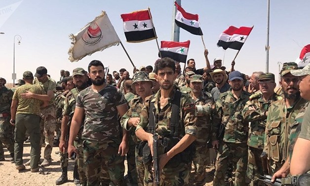 Syrian army, allies take last Islamic State bation in Syria - Press Photo