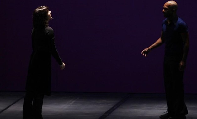 British choreographer Akram Khan (R) and French actress Juliette Binoche perform during their contemporary piece "IN-I" in Abu Dhabi January 28, 2009 as part of their global tour. REUTERS/Jumana El Heloueh
