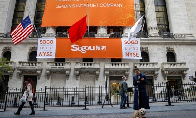 A banner hangs for China-based Sogou Inc to celebrate their IPO at the New York Stock Exchange (NYSE) in New York, U.S., November 9, 2017. REUTERS/Brendan McDermid