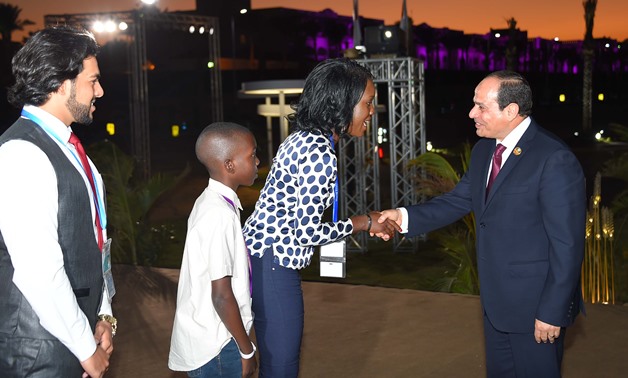 President Abdel Fatah al-Sisi greets Malawi Rachel Sibande at the World Youth Forum in Sharm el Sheikh- Press photo