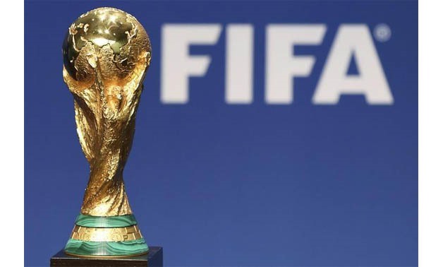 A replica of the FIFA Soccer World Cup Trophy is pictured at the FIFA headquarters in Zurich January 23, 2014 - REUTERS
