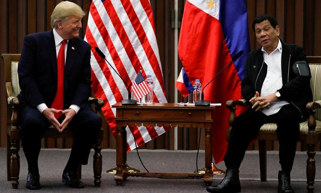 U.S. President Donald Trump holds a bilateral meeting with President of the Philippines Rodrigo Duterte alongside the ASEAN Summit in Manila, Philippines November 13, 2017. REUTERS/Jonathan Ernst

