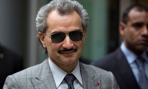  Saudi Arabian Prince Alwaleed bin Talal leaves the High Court in London July 2, 2013. REUTERS/Neil Hall
