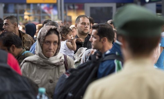 Migrants arrive to the main railway station in Munich, Germany, September 1, 2015. REUTERS/Lukas Barth