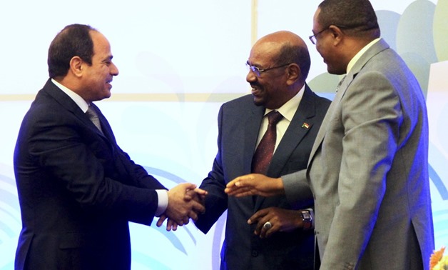 Egypt’s President Abdel Fattah al-Sisi, left, with his Sudanese counterpart, Omar Hassan al-Bashir, center, and the Ethiopian Prime Minister Hailemariam Desalegn. Photograph: Mohamed Nureldin Abdallah/Reuters