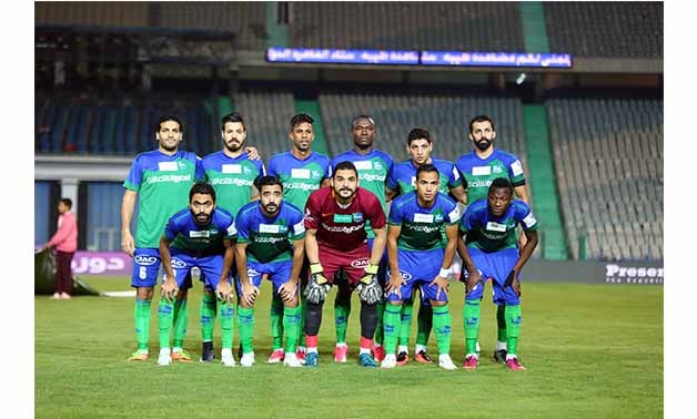 Soccer, Egyptian League, Misr El Mikasa players pose for a silencee minute against Zamalek - Egypt Today/ Hassan Mohamed