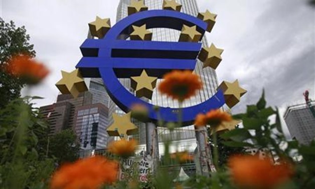 A structure showing the Euro currency sign is seen in front of the European Central Bank (ECB) headquarters in Frankfurt July 11, 2012 -
REUTERS