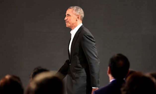Barack Obama took aim at US President Donald Trump in a New Delhi speech over his successor's threat to leave the 2015 Paris climate accord (AFP Photo/MONEY SHARMA)