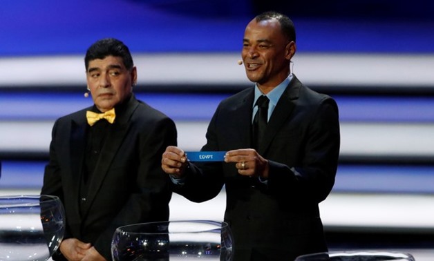 2018 FIFA World Cup Draw - State Kremlin Palace, Moscow, Russia - December 1, 2017 Cafu pulls out Egypt during the draw as Diego Maradona looks on REUTERS/Sergei Karpukhin