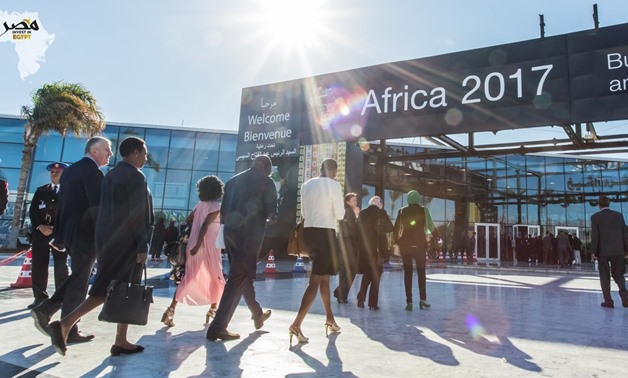 Attendees of the second day of Africa 2017 Forum heading into the forum venue in Sharm El Sheikh - Press Photo
