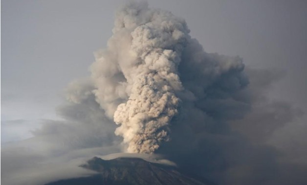 FILE PHOTO: Mount Agung volcano erupts as seen from Kubu, Karangasem Regency, Bali, Indonesia November 28, 2017. REUTERS/Darren Whiteside/File Photo
