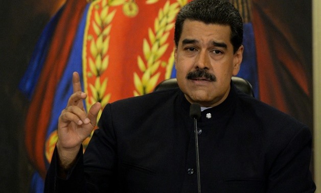 Venezuelan President Nicolas Maduro's ruling party was handed a clear path to victory in local elections after the main parties in the opposition coalition refused to participate - AFP/File / Federico PARRA