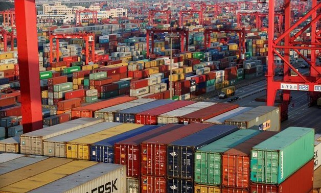 Container boxes are seen at the Yangshan Deep Water Port, part of the Shanghai Free Trade Zone, in Shanghai, China September 24, 2016. REUTERS/Aly Song