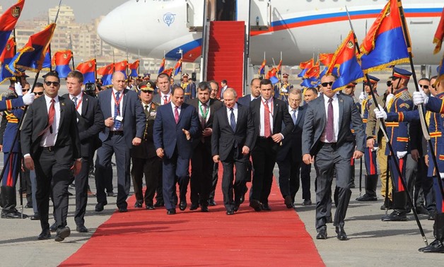 President Sisi receives his counterpart Putin at the Cairo International Airport- Press Photo