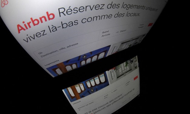 This file photo taken on March 02, 2017 shows shows the logo of online lodging service Airbnb displayed on a computer screen in Paris. Airbnb agreed on December 11, 2017 to withdraw a payment system in France, suspected of facilitating tax avoidance, afte