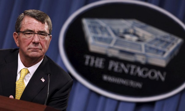 U.S. Defense Secretary Ash Carter listens to questions during a news conference at the Pentagon in Arlington, Virginia in this August 20, 2015 file photo. REUTERS/Jonathan Ernst