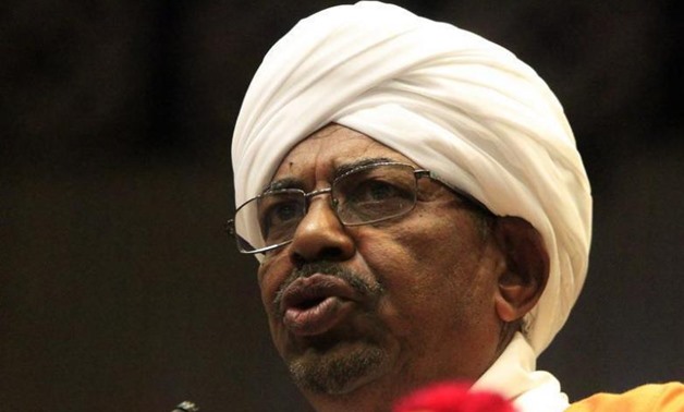 Sudan's President Omar al-Bashir gives an address at the opening of the eighth session of Parliament in Khartoum October 28, 2013. REUTERS/Mohamed Nureldin Abdallah