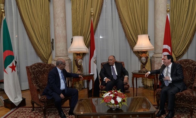Egypt’s Foreign Minister Sameh Shoukry meets with his Tunisian and Algerian (L) counterparts in Cairo to discuss the Libyan political course on November 15 – Press Photo