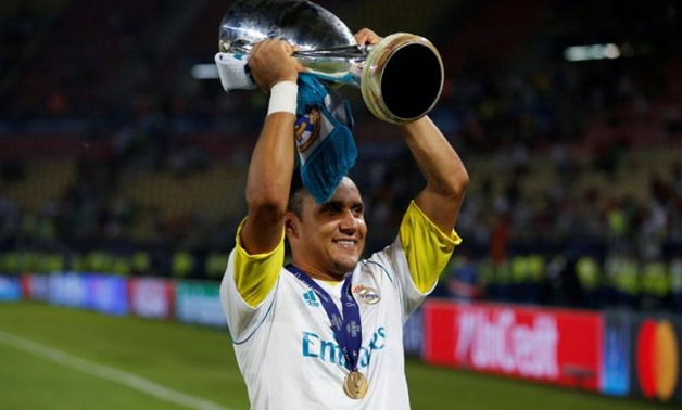 Skopje, Macedonia - August 8, 2017 Real Madrid's Keylor Navas celebrates winning the super cup final with the trophy REUTERS/Peter Cziborra