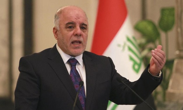 Iraq's Prime Minister-designate Haider al-Abadi gestures during a news conference in Baghdad August 25, 2014. REUTERS/Mahmoud Raouf Mahmoud