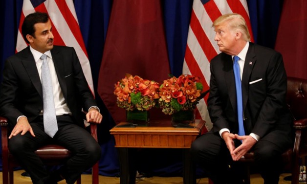 U.S. President Donald Trump meets with Qatar's Emir Sheikh Tamim bin Hamad al-Thani in New York U.S. September 19-2017 - REUTERS