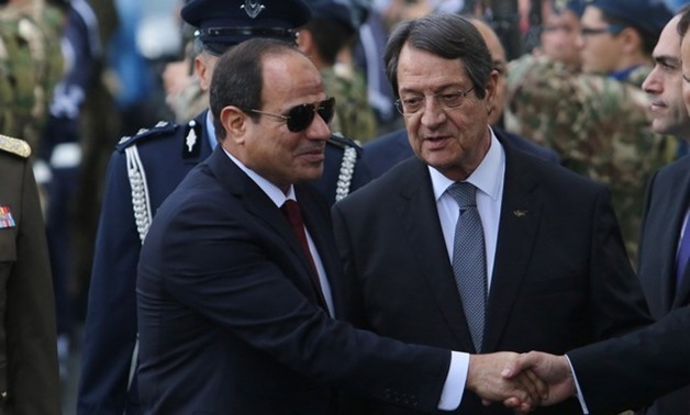 File- Cypriot President Nicos Anastasiades (R) and Egyptian President Abdel Fattah al-Sisi during a welcome ceremony the Presidential Palace in Nicosia, Cyprus November 20, 2017. REUTERS/Yiannis Kourtoglou