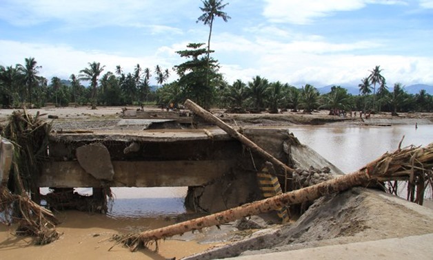 A general view of a destroyed bridge after flash floods in Salvador, Lanao del Norte in southern Philippines, December 23, 2017. REUTERS/Richel V. Umel
